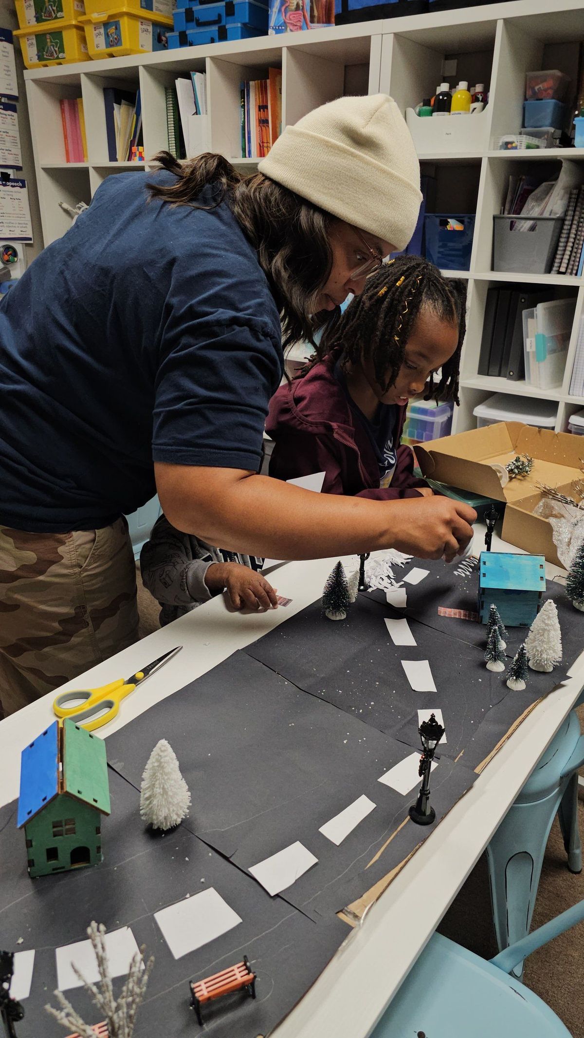 Guide and scholars building a detailed city model